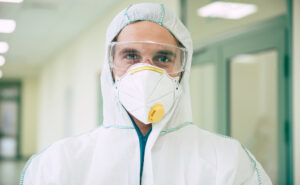 Asbestos removal expert wearing PPE